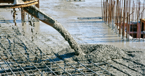 concrete being poured on top of rebar